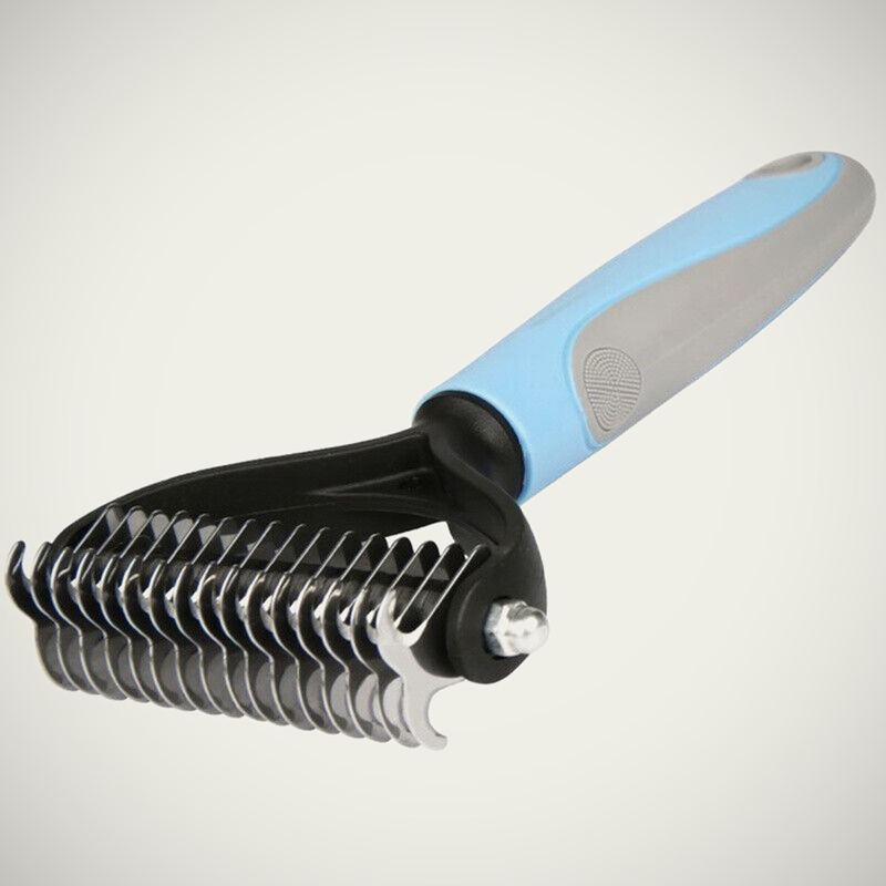 Deshedding Rake. Reaches the undercoat a brush slides over.