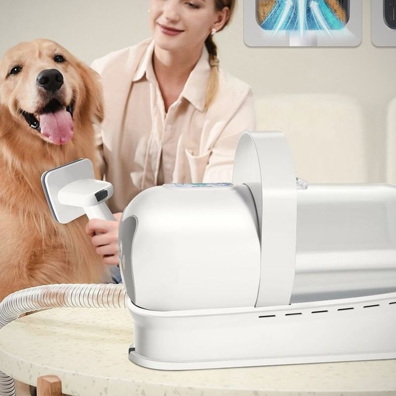 The Grooming Vacuum. The fur goes in the canister, not on your floor.